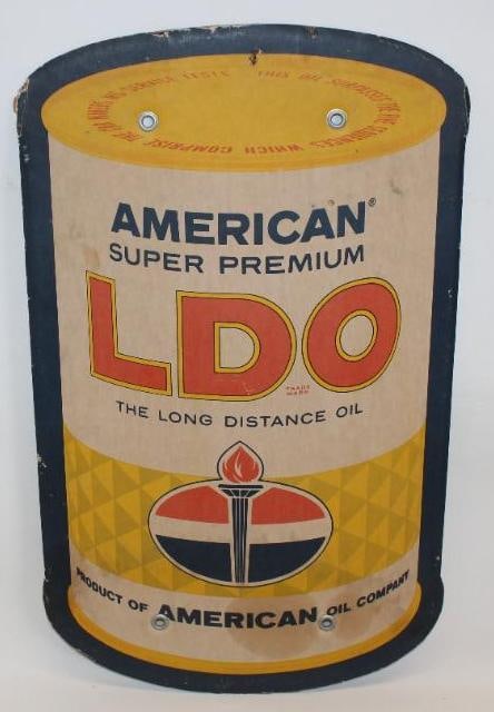 American Oil Company LDO Can Shaped Sign: This is a single sided cardboard sign. There is some slight discoloration but displays nicely overall. This sign measures 29" x 18" and is graded an 8.