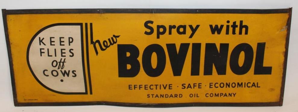 Standard Oil Company Spray With Bovinol Metal Framed Cardboard Sign: This sign shows some light staining and a tear near the top right corner. It measures 15" x 40" and is graded a 7.75.