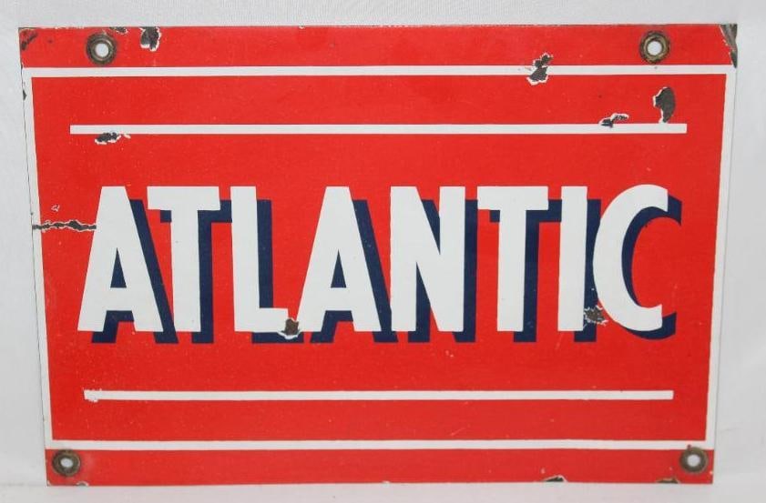 Atlantic Porcelain Gas Pump Plate Sign: This sign has some minor chips throughout the field. It measures 13" x 9" and is graded a 7.75.