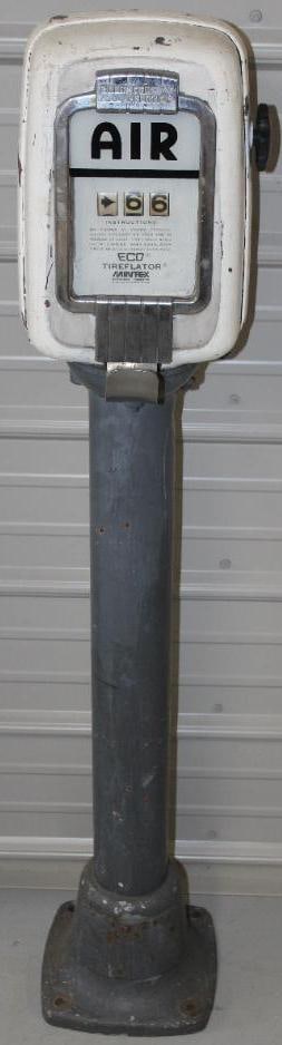 Eco Tireflator Air Meter with Pedestal Base: The top of this air meter shows an older repaint with crackled white paint. The base shows a gray repaint. The handle turns and works the numbers. This meter measures 50" x 9" x 9".