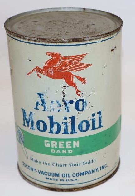 Socony-Vacuum Aero Mobiloil Green Band One Quart Metal Oil Can: This can is empty. It has been drained by two holes in the bottom lid. There is some fading to the blue lettering on both sides. There is also some denting and discoloration to the reverse. This can m