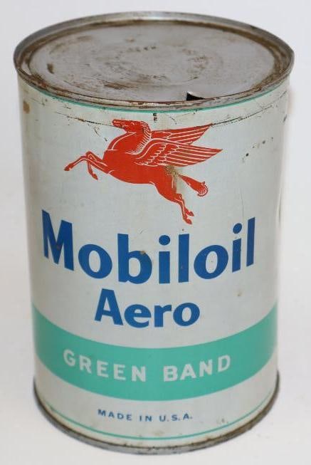 Aero Mobiloil Green Band One Quart Metal Oil Can: This can is empty. It has been drained by two holes in the top lid. The display side shows some light fading to the white areas. There are also minor surface scratches and staining. The reverse has so