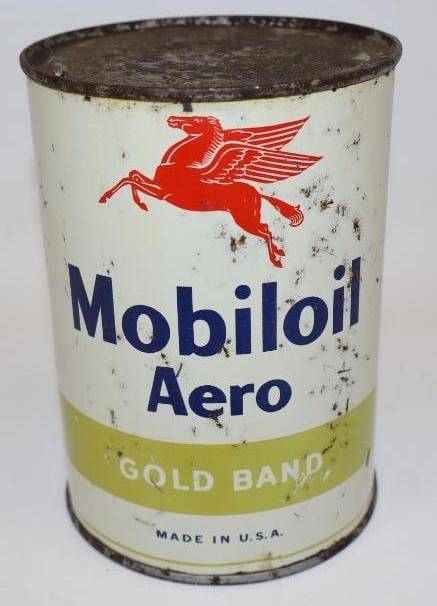 Mobiloil Aero Gold Band One Quart Metal Oil Can: This can is empty. It was drained by two holes in the top lid. The display side shows some fading to the gold. There are some small spots of rust staining. The reverse shows some additional rust spots