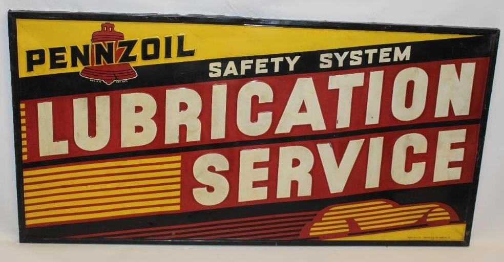 Pennzoil Safety System Lubrication Service Painted Embossed Metal Sign with Original Wood Frame: This painted tin sign sits on the original wood frame. There is an art deco style car graphic. The sign has some waves to the metal, and some discoloration to the white lettering. There is also some l