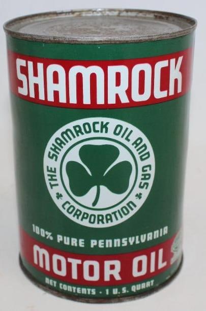 Shamrock One Quart Metal Oil Can: This can is in very good overall condition with good color and gloss. It shows some minor wear throughout. The bottom lid has been replaced. This can measures 4" x 4" x 6" and is graded a 9.