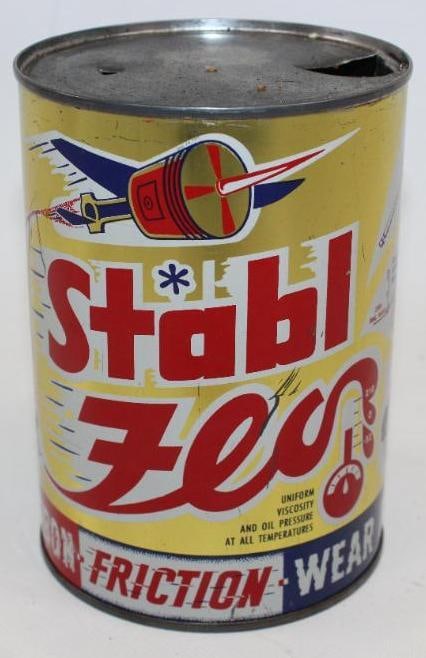 Graphic Stabl Flo Oil Additive Metal One Quart Oil Can: This can is empty and has been drained from the top lid. It is in excellent overall condition with only light wear. There are light scratches on both sides of the can. This can measures 4" x 4" x 6" a