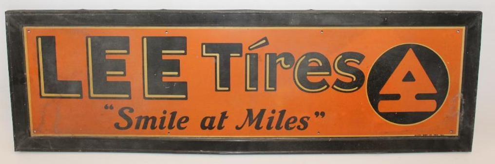 Lee Tires "Smile at Miles" Self Framed SST Advertising Sign: This sign is marked Brank Sign Co. NY. It shows some slight crazing throughout the field. There is also some discoloration throughout. This sign measures 35" x 10.75" and is graded 7.75.