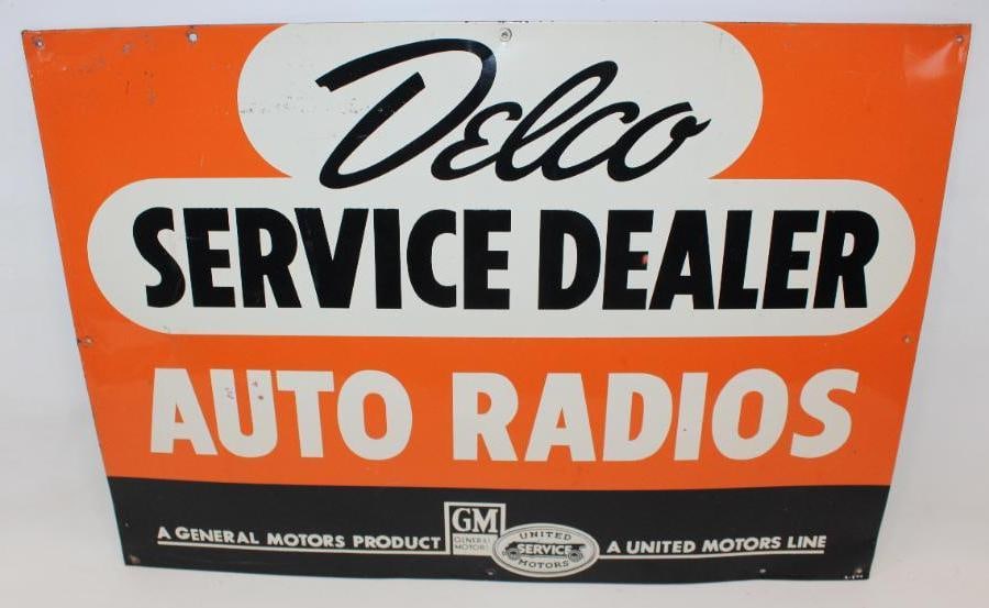 GM United Motor Service Delco Service Dealer Auto Radios SST Sign: This sign is marked A-644. It has good color and gloss with light surface wear and scratches to the field. This sign measures 27.25" x 19.25" and is graded an 8.25.