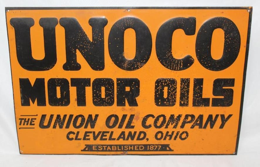 Unoco Motor Oils Embossed SST Sign: This sign shows several small areas of rust and rust staining. It measures 13.5" x 19.5" and is graded a 7.