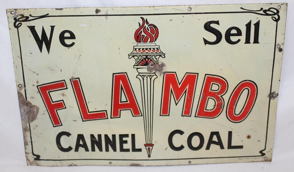 We Sell Flambo Cannel Coal Embossed SST Sign: This sign is marked National Sign Co. on the lower right side. The sign shows some light paint flaking to the red areas and some damage to the field. There is heavier wear along the perimeter. This si