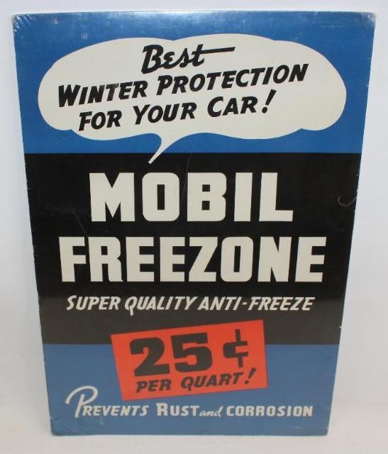 Mobil Freezone Super Quality Anti-Freeze Advertising Poster with 25? Pricer: This poster is shrink wrapped to a foam backing. It is in very good condition with only light wear. This poster measures 17.5" x 25.5" and is graded an 8.75.