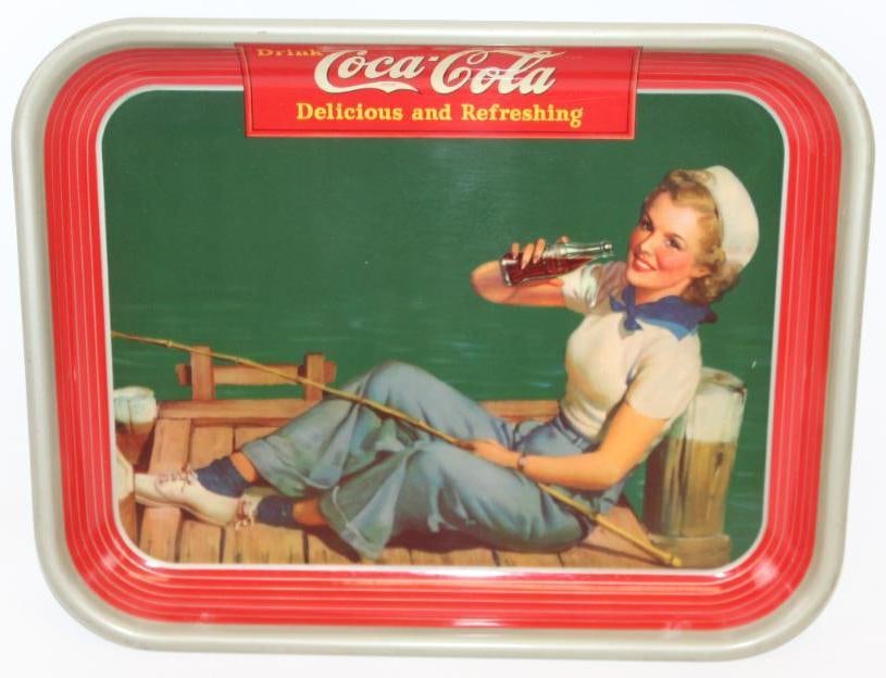 1940 Drink Coca-Cola Delicious and Refreshing with Sailor Fishing Girl: This tray is marked The American Artworks inc. Coshocton OH. It is in overall very nice condition with only minor wear. This tray measures 13.25" x 10.5" x 1.25" and is graded a 9.