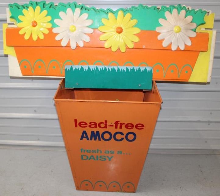 Amoco "Fresh as a Daisy" Service Station Island Advertising Trash Can: This is a metal trash can with embossed plastic flower toppers. There are some edge chips and cracks on the plastic flowers. The metal display is in good overall condition with just some light wear an