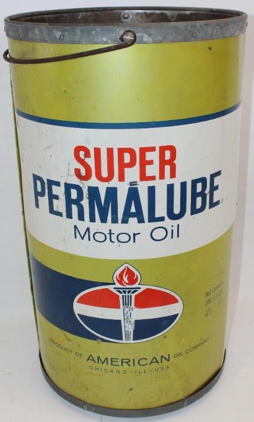 Amoco Permalube Oil Can Shaped Trash Can: This is a painted metal trash can with the Amoco Permalube and LDO oil can designs. There are some light surface scratches throughout as well as some rust staining. It measures 26" x 15" x 15" and is