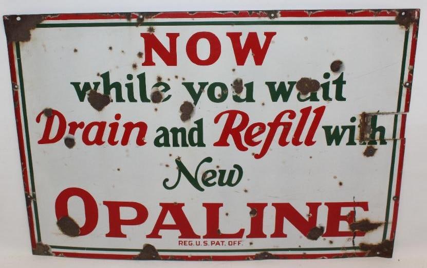 Sinclair Opaline Drain and Refill SSP Porcelain Sign: This sign shows several chips throughout the field, and a cut area on the right edge. There are also heavy chips at the mounting holes. This sign measures 24" x 36" and is graded a 6.