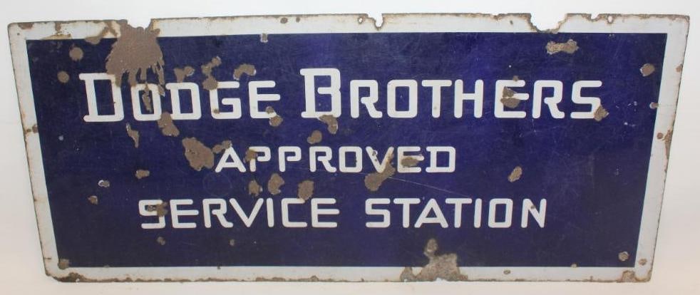 Dodge Brothers Approved Service Station Porcelain DSP Sign: This sign shows areas of chipping and heavy surface scratches throughout the field. The sign has also rusted through at the mounting holes. It measures 40" x 18" and is graded a 6 on the display side