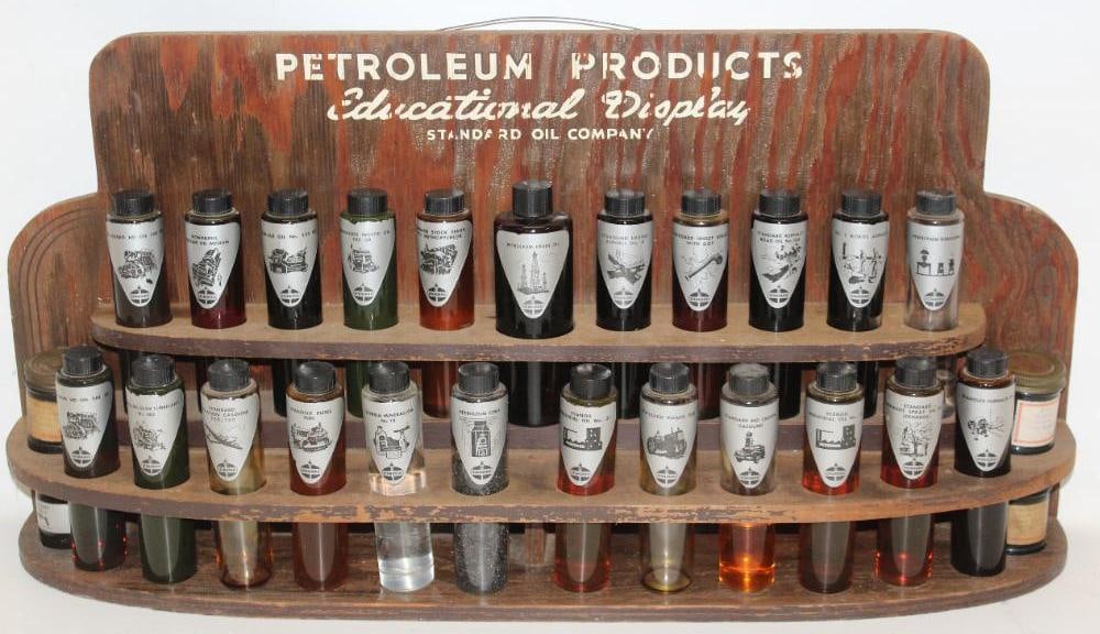 Standard Petroleum Products Educational Display Sample Kit: This is a complete sample kit with various lubrication samples on the original wooden display rack. The back of the rack also has several paper labels and details. This kit measures 30" x 15" x 6".