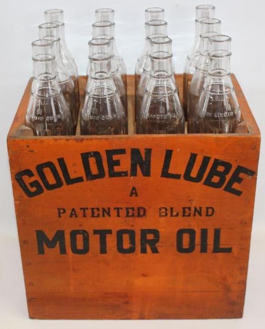 Case of Twelve Golden Lube Oil Bottles: This is a wooden crate marked Golden Lube Motor Oil. There are seven bottles marked Seal Cap and five are unmarked, however the bottle styles are all matching. The overall measurements are 21" x 11" x