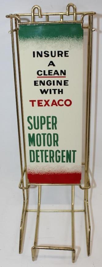 NOS Texaco Super Motor Detergent Wall Mount Metal Dispenser Display Can Rack in Original Box: This display rack has a metal sign that is marked A-M 1-59. It is in excellent overall condition. This rack measures 5" x 7" x 16" and is graded 9+.