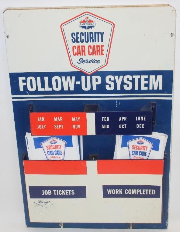 American Security Car Care Service Advertising Display: This is a single sided metal display. It is in very good condition with some light wear and scratches to the field. This includes several receipt bags. The display measures 29" x 18.5" and is graded a