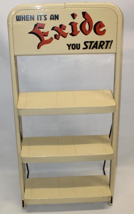 "When It's An Exide You Start!" Exide Batteies Advertising Metal Display Rack: This display rack is marked Eagle Sheet Metal Mfg Co Chicago. It is painted with a heavy enamel paint. The rack is in good condition with only minor wear throughout. This display rack measures 24" x 1