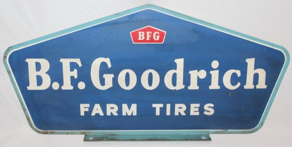 B. F. Goodrich Farm Tires DST Rack Sign: This sign shows some fading and light wear throughout the field. It measures 22" x 10.5" it is graded 8.25 on the display side and 7.75 on the reverse.