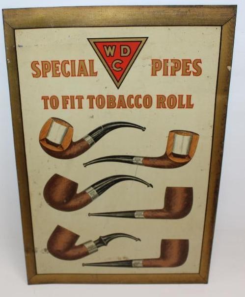 1920's William Demuth Company Special Pipes to Fit Tobacco Roll SST Advertising Sign: This sign has great graphics with some surface wear and scratches to the field. This sign measures 9.25" x 13.75" and is graded an 8.25.