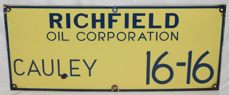 Richfield Oil Corporation Porcelain Lease Sign Cauley: This sign has good color and gloss with one chip in the field. There is also some slight edge wear. This sign measures 10" x 24" and is graded an 8.75.