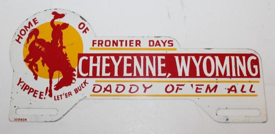 Cheyenne, Wyoming Home of Frontier Days License Plate Topper: This license plate topper is in very good condition with only light surface wear. This license plate topper measures 10" x 5" and is graded an 8.5.