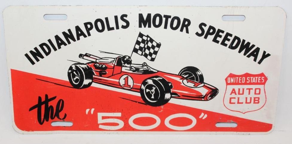 Indianapolis Motor Speedway The "500" Booster License Plate: This plate is in very good condition with only light wear to the field. This booster plate measures 12" x 6" and is graded an 8.75.