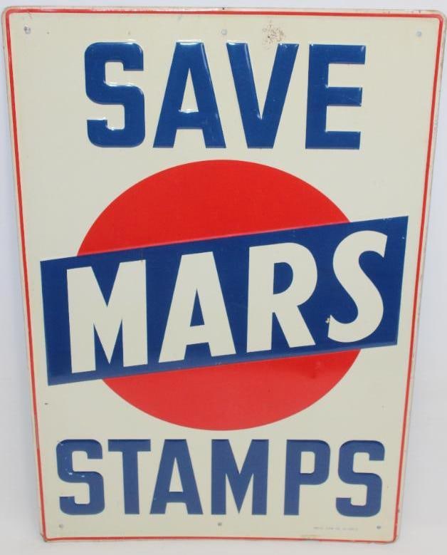 Save Mars Stamps Embossed SST Sign: This sign shows good color throughout with some slight rust staining near the top edge. It is marked The Press Sign Co. This sign measures 36" x 24" and is graded an 8.5.