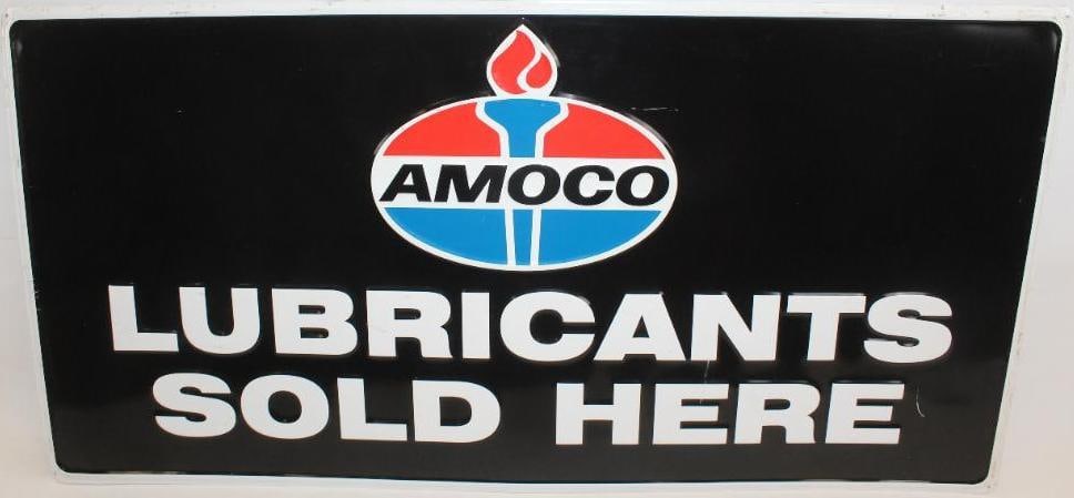 Amoco Lubricants Sold Here Embossed SST Sign: This sign is in great condition and shows slight scratches throughout the field. It measures 24" x 48" and is graded an 8.75.