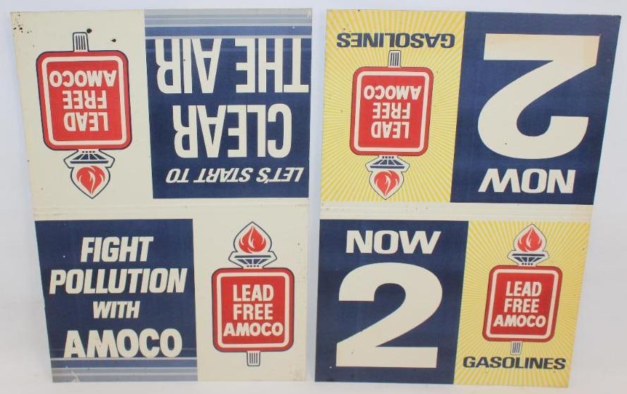 Group of 2 Amoco Lead Free Gas Pump Topper Signs: These are new old stock and have never been used. They both show some areas of staining throughout. They are made of a heavy cardstock material. The signs measure 28" x 19.5" each and are both graded