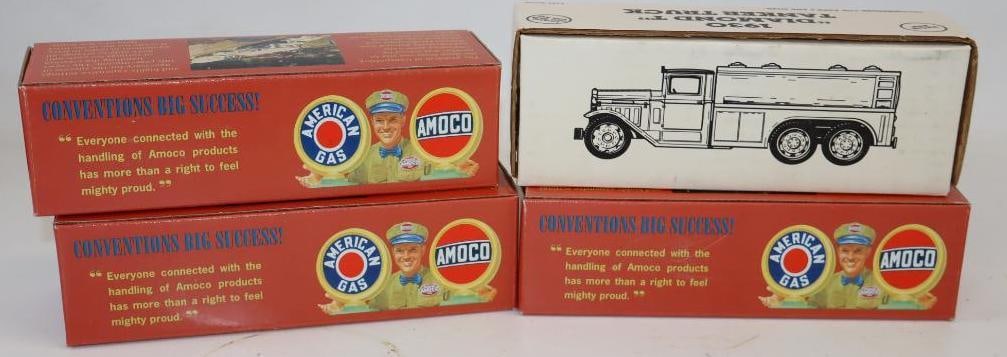 Group of 4 Amoco Ertl Diamond REO Tractor Trailer Bank in Original Boxes: 8.5" x 2.5" x 3" each