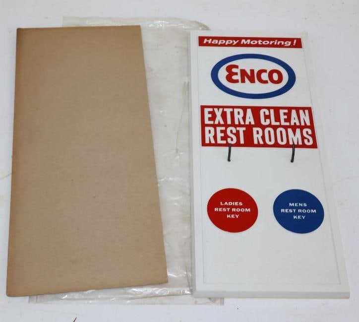Enco Happy Motoring Extra Clean Restroom Sign Key Holder: 5.25" x 12.25" x 1" sign is marked Kirby Coggeshall Steinau Co. Inc. Milwaukee WI