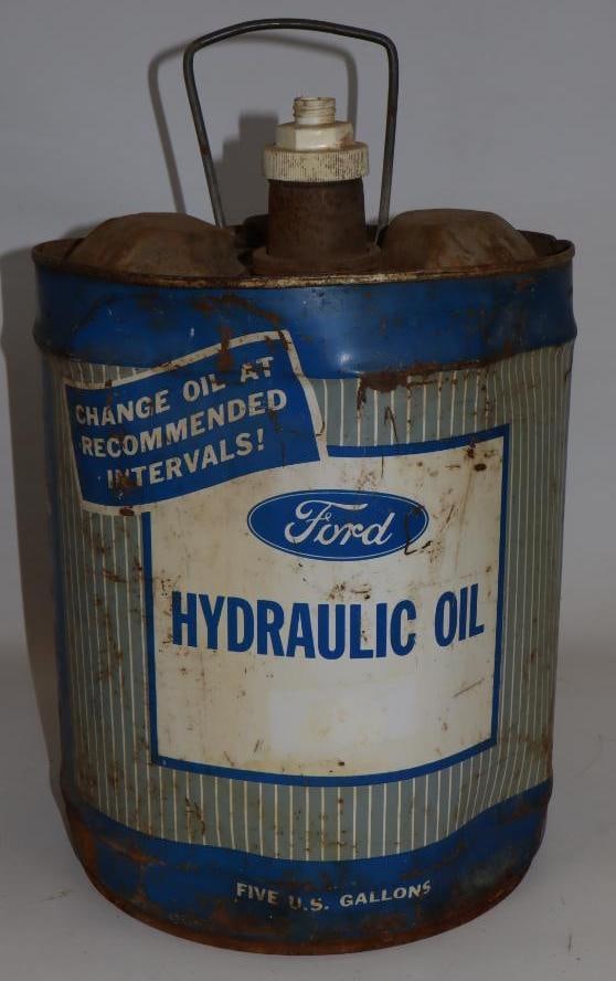 Ford Hydraulic Five Gallon Round Metal Oil Can: Missing one cap. 11" x 11" x 15"