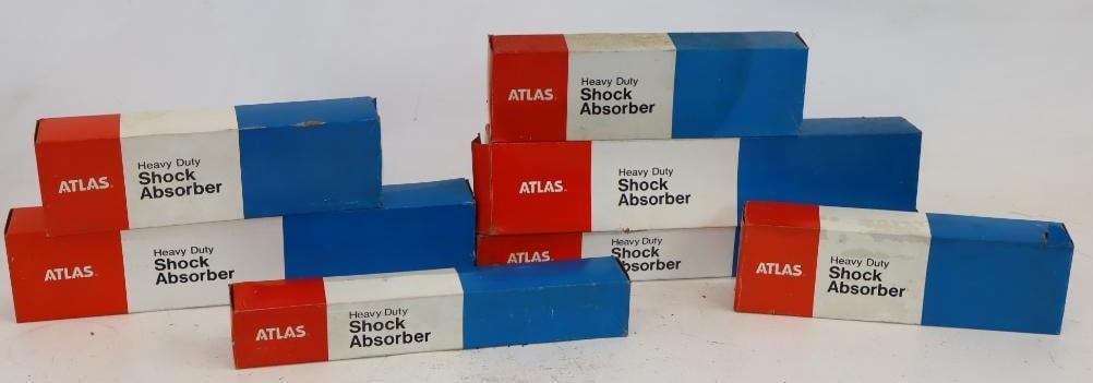 Group of 7 Atlas NOS Shock Absorbers in Original Box: Largest is 18" x 4" x 2"