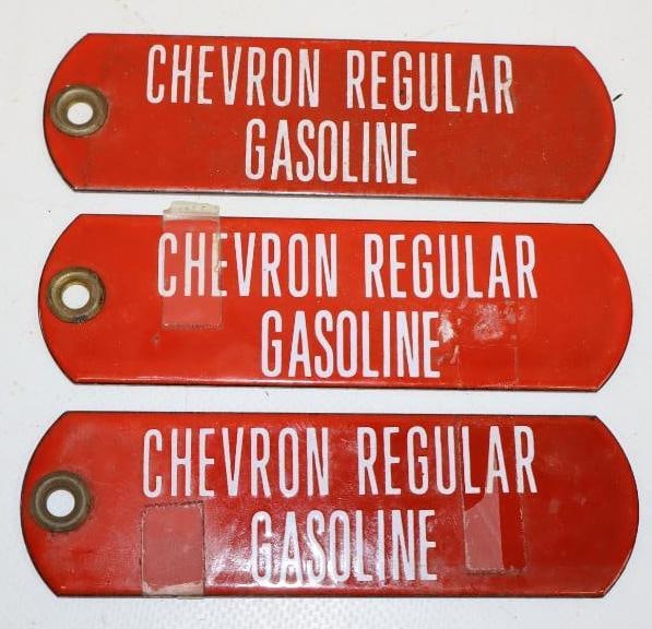 Group of 3 Porcelain Chevron Regular Gasoline Fuel Tags: 5" x 1.5" each
