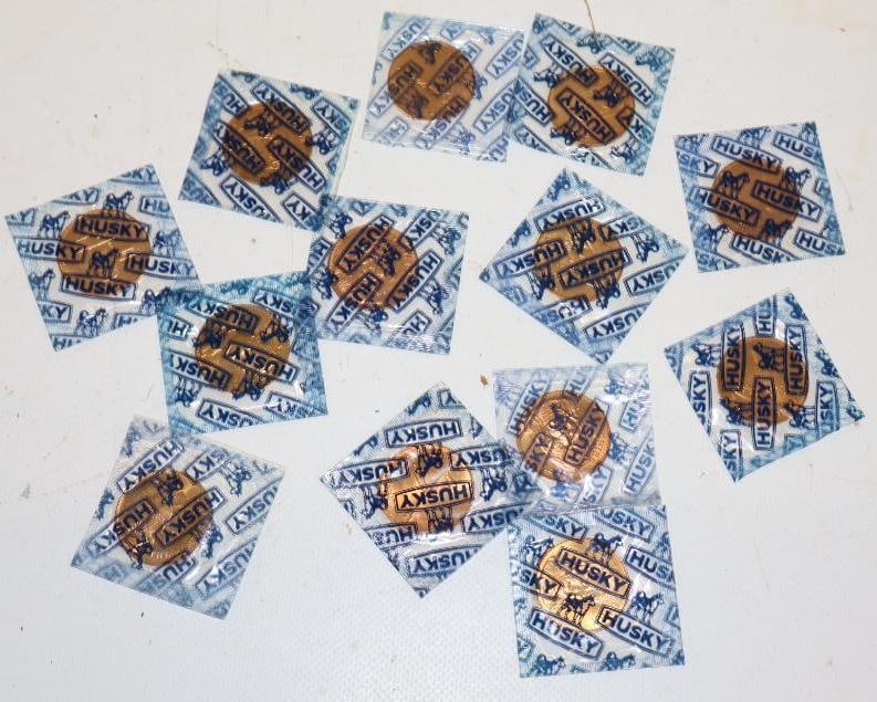 Group of 13 Husky Historic Figures Coins in Original Packaging: 1.5" x 1.5" each