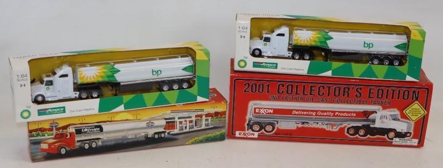Group of 4 Exxon, Amoco, & BP Advertising Gas Station Toy Tanker Trucks in Original Boxes: Largest is 16" x 5.5" x 4"