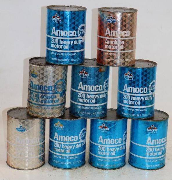 Group of 9 Amoco 200, All Season, and Amolube One Quart Composite Oil Cans: Empty. 4" x 4" x 5.5" each