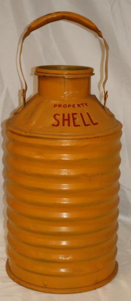 Embossed Shell Sexton Armored 5 Gallon Bulk Oil Can: 11" x 11" x 21" is missing lid and has been repainted
