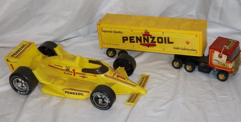 Group of 2 Pennzoil Toy Race Car and Semi Truck: Largest is 19" x 3.5" x 5"