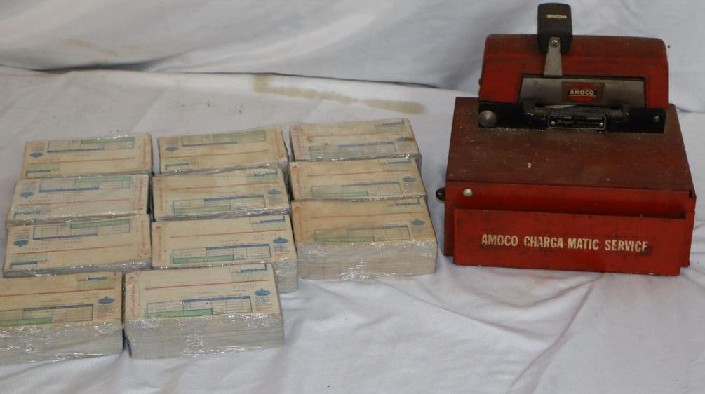Group of 12 Amoco Credit Card Machine and Eleven Unopened Carbon Copy Receipt Packs: Largest is 8.5" x 9.5" x 8"