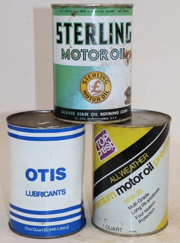 Group of 3 Top Crest, Sterling, and Otis Metal One Quart Oil Cans: Sterling is aluminum, and has bullet holes. Empty. 32oz each