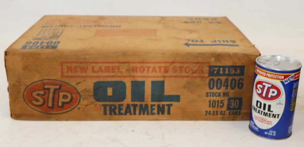 Group of 24 STP Composite Fifteen Ounce Oil Treatment Cans in Original Case: Cans are full. 15oz each. Case measures 18.5" x 12.25" x 5.25"