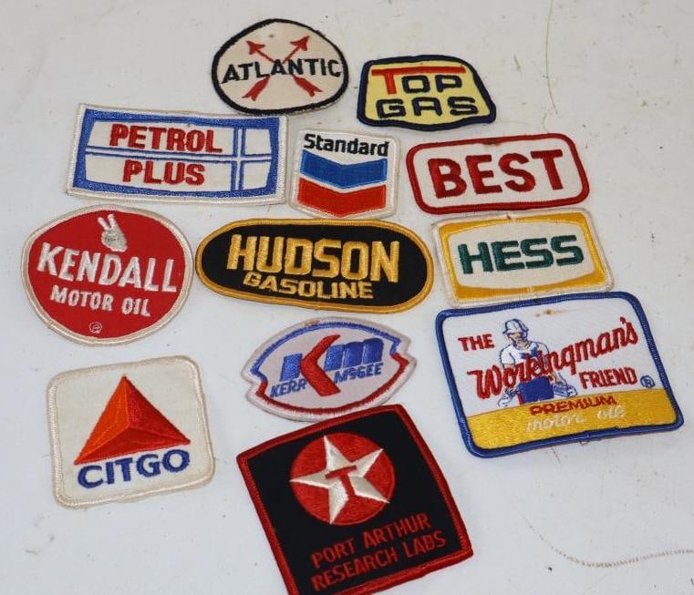 Group of 12 Advertising Coat Patches: Largest is 4" x 2.25"