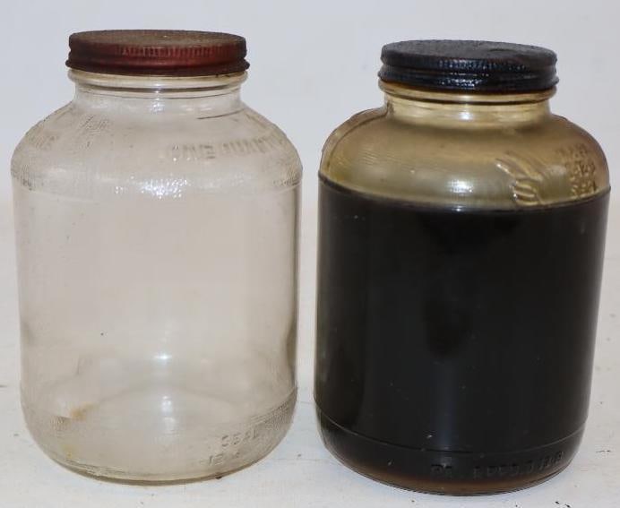 Group of 2 Kendall the 2000 Mile Oil Wartime Glass Quart Oil Jars: One is full, other is empty. 32oz