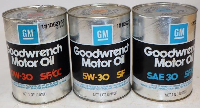 Group of 3 Different GM Goodwrench Composite One Quart Oil Cans: Empty. 4" x 4" x 5.5" each