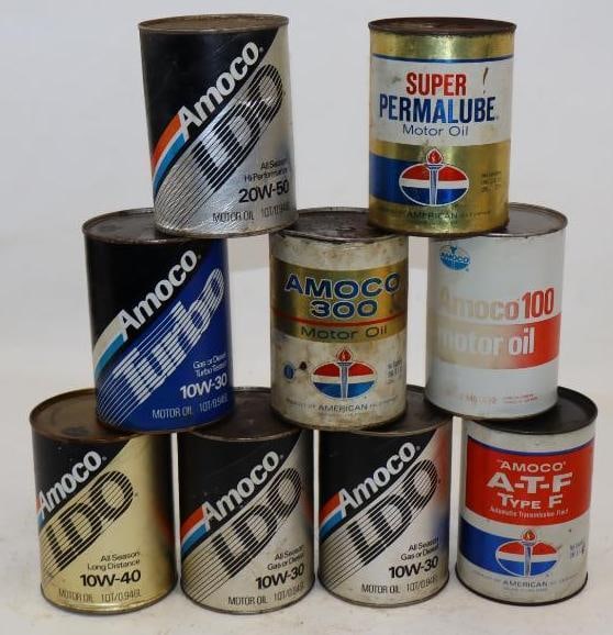 Group of 9 Amoco Composite One Quart Oil Cans: Empty. 4" x 4" x 5.5" each